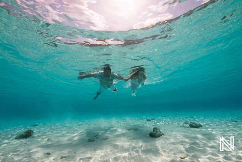 Couple underwater photoshoot at Cas Abao Beach
