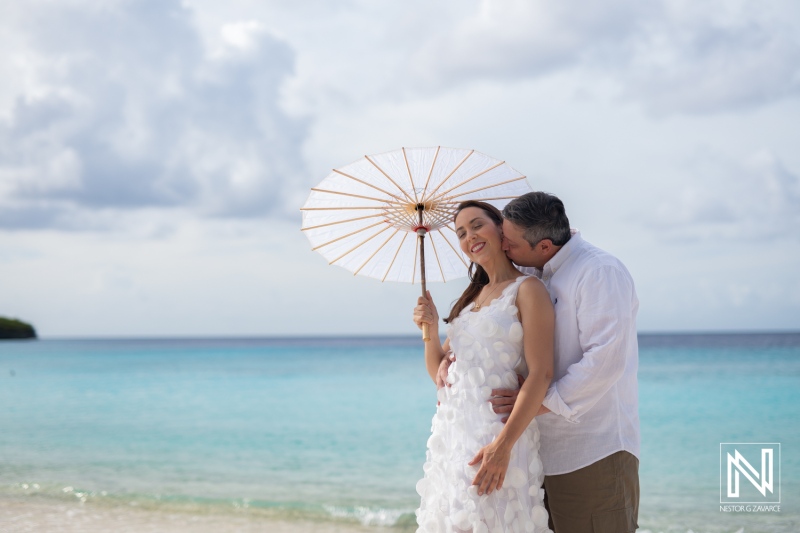 Couple celebrates vow renewal on Cas Abao Beach in Curacao under a beautiful sky