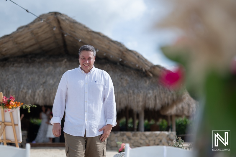 Vow renewal celebration at Cas Abao Beach in Curacao with joyful emotions and a beautiful backdrop