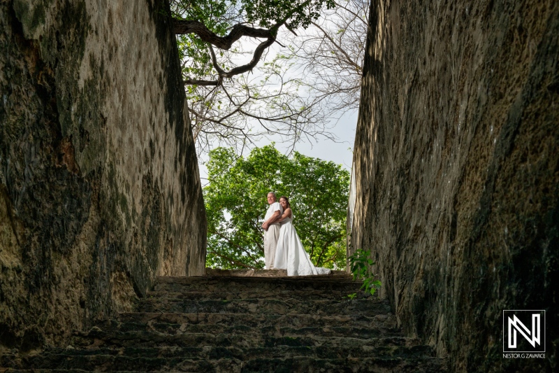 Couple celebrates vow renewal in a romantic outdoor setting in Curacao