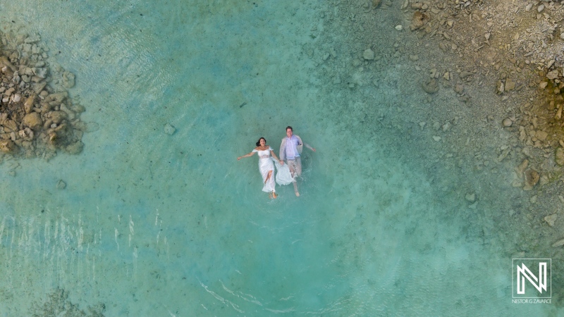 Couple vows to celebrate their love at Doggy Beach in Curacao, surrounded by calm turquoise waters