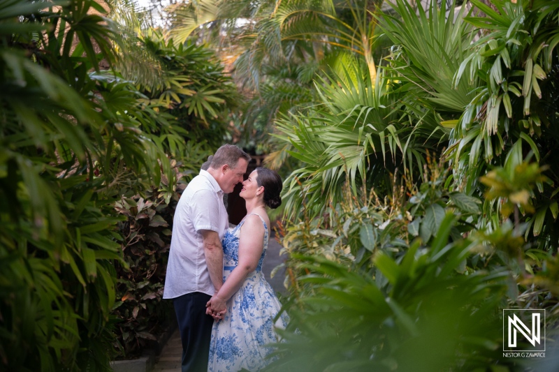 Couple Kissing in the Tropical Garden