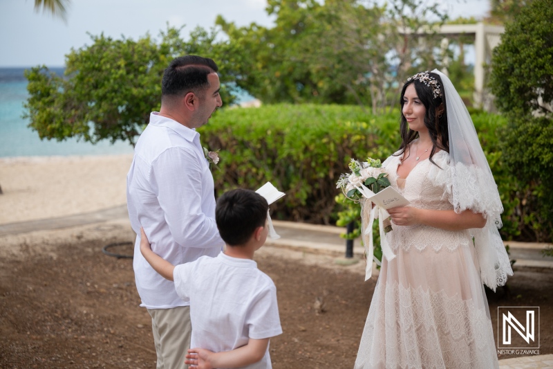 Vow renewal ceremony at Curacao Marriott Beach Resort with family and friends present