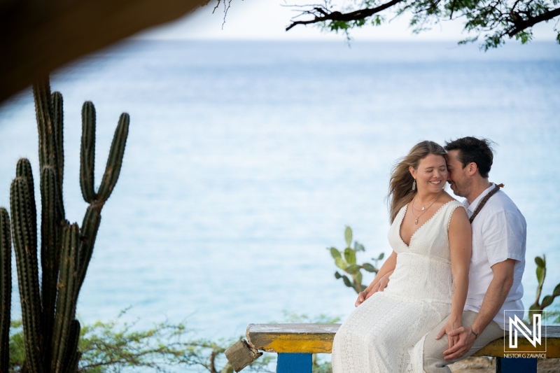 Vow renewal ceremony at Playa Jeremi in Curacao during a sunny day with a couple enjoying their special moment