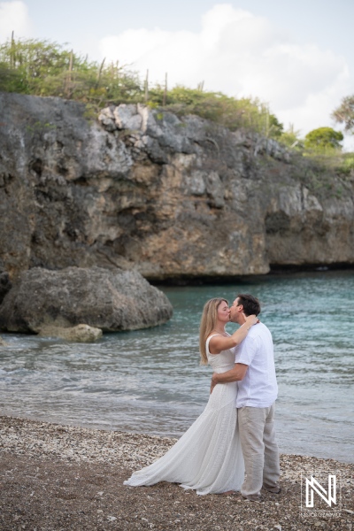 Couple renews vows at Playa Jeremi with ocean views and surrounding rocks