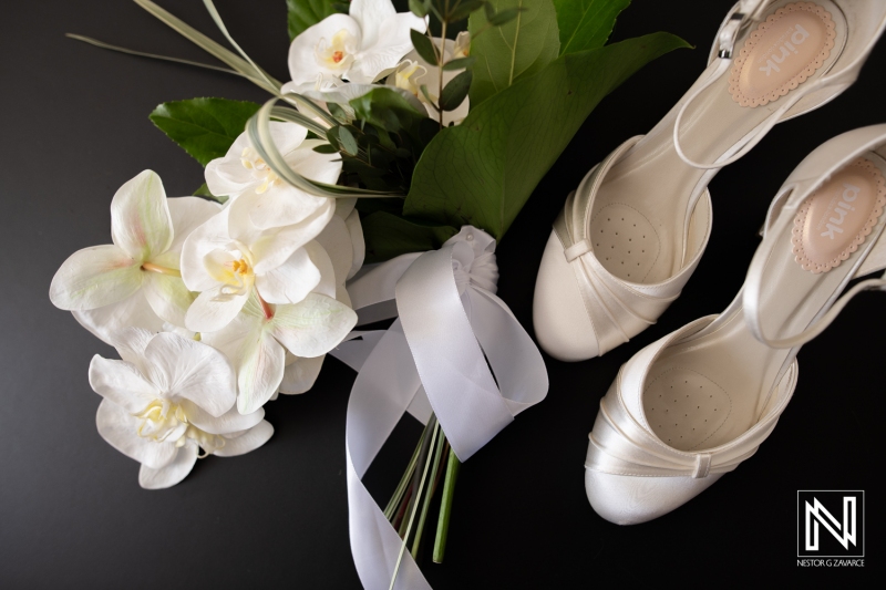 Bouquet with bridal shoes