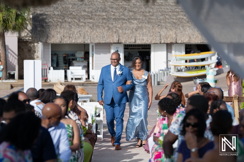 Groom walking down the aisle