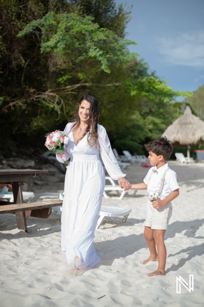Bride walking down the isle at the beach