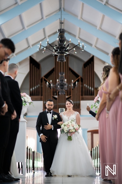 Bride and Groom walking down the isle