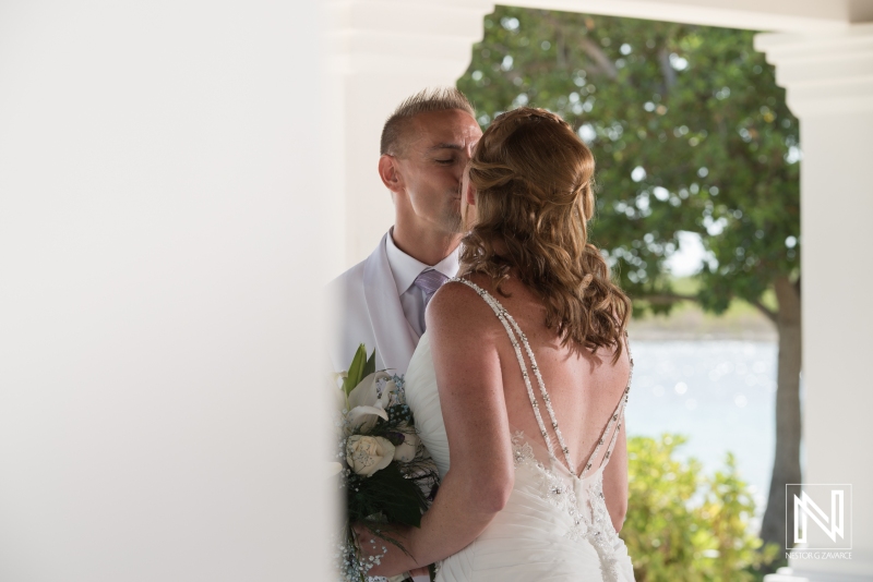 Bride and groom kissing