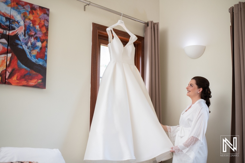 Bride looking at the dress