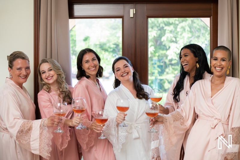 Bride and bridesmaids with bathrobes