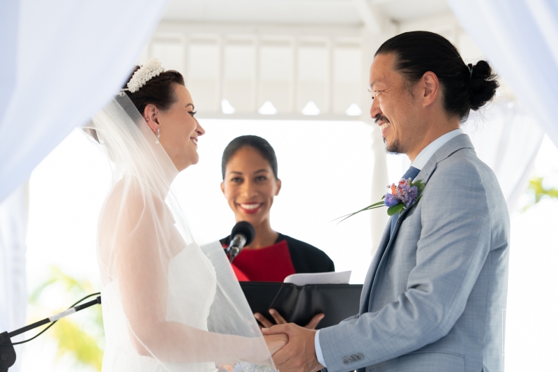 Bride and groom holding hands