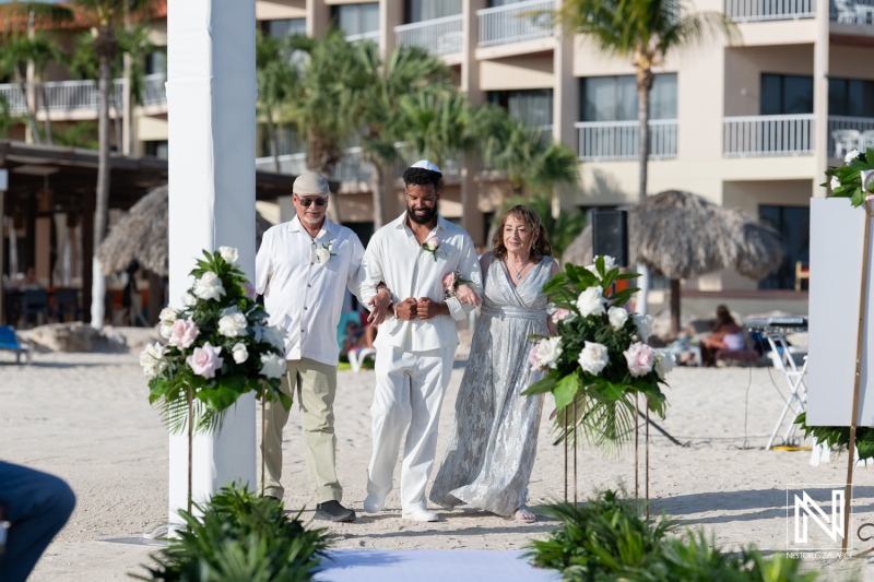 Groom walking down the aisle