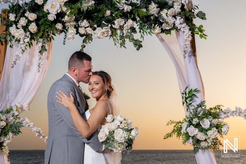 Celebrating love at Coral Estate Luxury Resort in Curacao during a romantic beach wedding ceremony