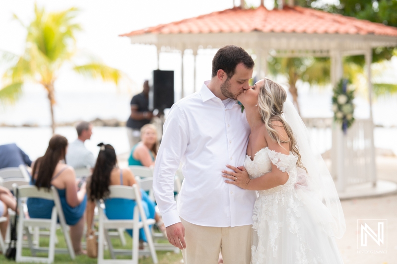 Bride and groom kiss