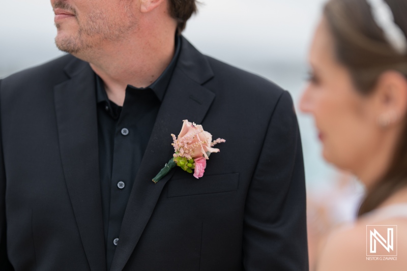 Elegant wedding ceremony at Sunscape Curacao by the beach with intimate moments captured