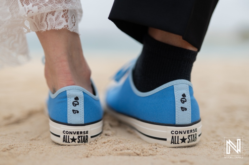 Unique wedding shoes on the beach at Sunscape Curacao during a romantic destination ceremony
