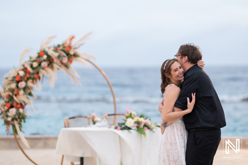 Beautiful moments at a romantic wedding celebration in Curacao overlooking the ocean
