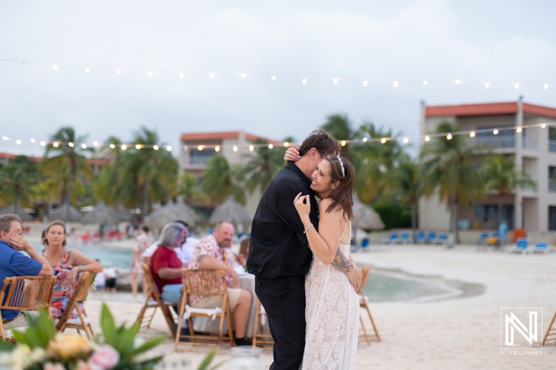 Couple shares a romantic dance during their destination wedding at Sunscape Curacao beachside venue