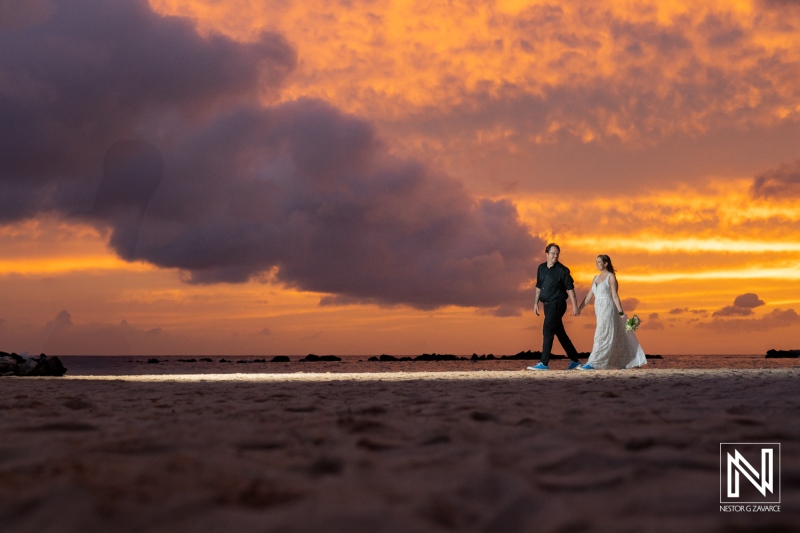 Couple enjoys sunset stroll after their wedding ceremony at Sunscape Curacao