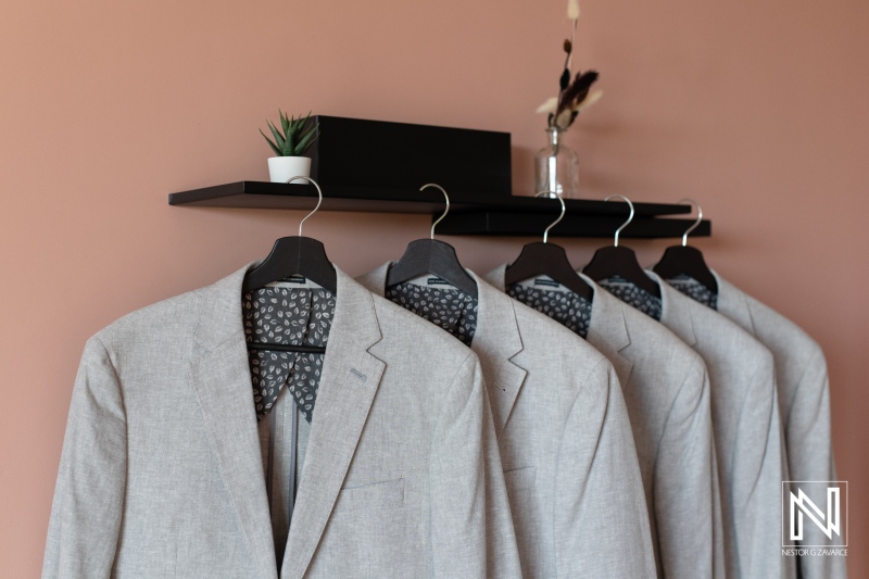 Elegant gray suits displayed for a destination wedding in Curacao at The Rif at Mangrove Beach Corendon