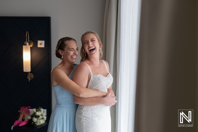Bridal preparation and joy during wedding day in Curacao at The Rif at Mangrove Beach Corendon