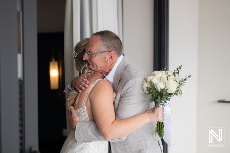 Emotional wedding moment in Curacao at The Rif, celebrating love and family at Mangrove Beach Corendon