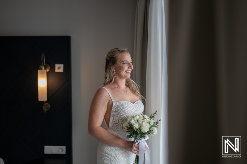 Beautiful bride preparing for wedding ceremony at The Rif at Mangrove Beach Corendon in Curacao