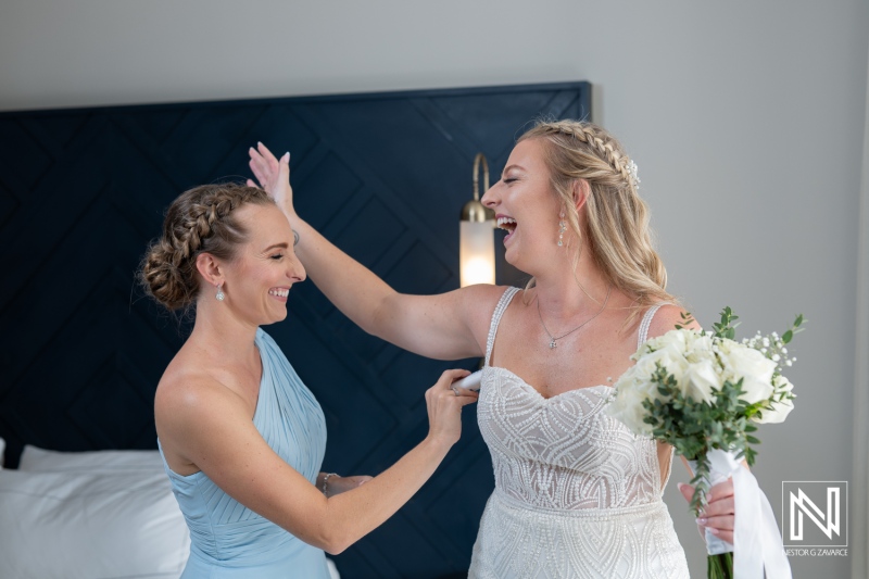 Beautiful bridal moments at a wedding celebration in Curacao at The Rif at Mangrove Beach Corendon as friends share laughter and joy
