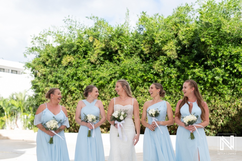 Elegant wedding celebration at Rif at Mangrove Beach in Curacao with joyful bride and bridesmaids
