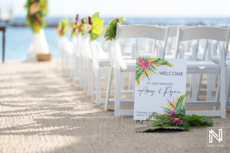 Wedding ceremony setup at the Rif at Mangrove Beach in Curacao with beautiful floral decorations and ocean views