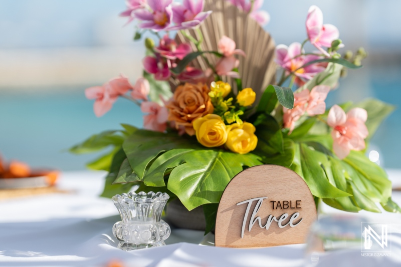 Beautiful floral arrangement at a wedding table in Curacao near the Rif at Mangrove Beach Corendon showcasing colorful flowers and elegant decor