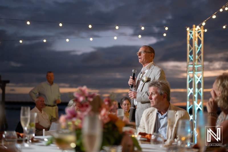 Wedding celebration at The Rif, Mangrove Beach in Curacao featuring heartfelt speeches and festive ambiance