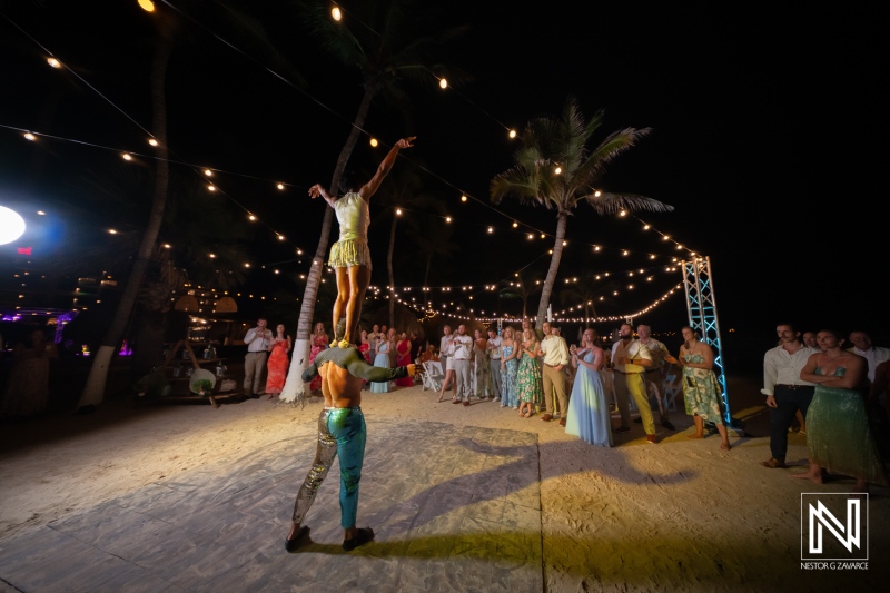 Celebration of love and joy during a wedding at Mangrove Beach in Curacao with lively performances and vibrant atmosphere