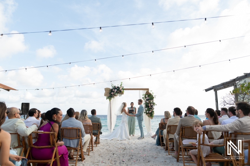 Wedding ceremony at Playa Hunku in Curacao with ocean view and beach setting