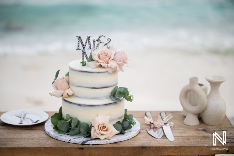 Wedding cake display at Playa Hunku in Curacao during a wedding celebration