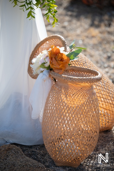 Beautiful wedding decoration with baskets and flowers at a wedding in Westpunt Curacao during a sunny day