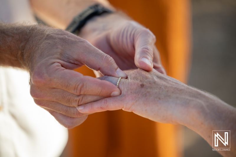 Wedding ceremony in Westpunt Curacao with engagement ring exchange during sunset