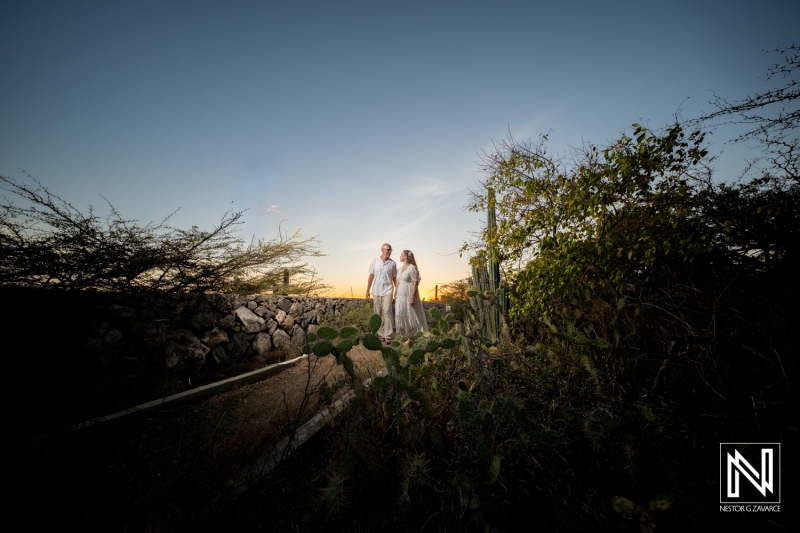 Couple celebrates wedding at sunset in Westpunt, Curacao surrounded by nature and beautiful scenery