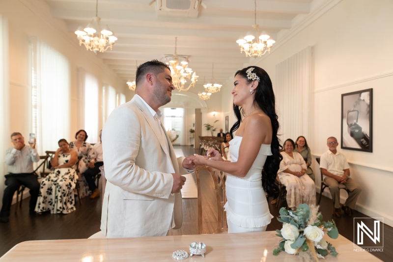 Couple exchanges vows during a wedding ceremony at Avila Beach Hotel in Curacao