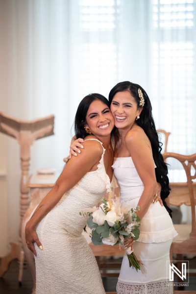 Wedding celebration at Avila Beach Hotel with joyful moments between bridesmaids