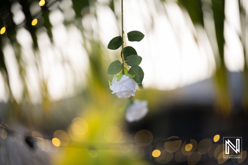 Wedding celebration at Avila Beach Hotel with flowers and decorations in the background