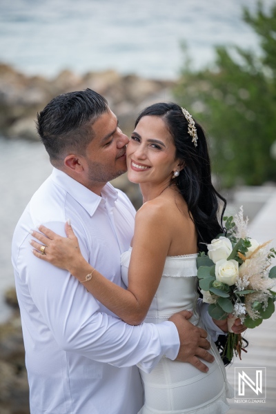 Couple shares a moment during a wedding at Avila Beach Hotel in Curacao