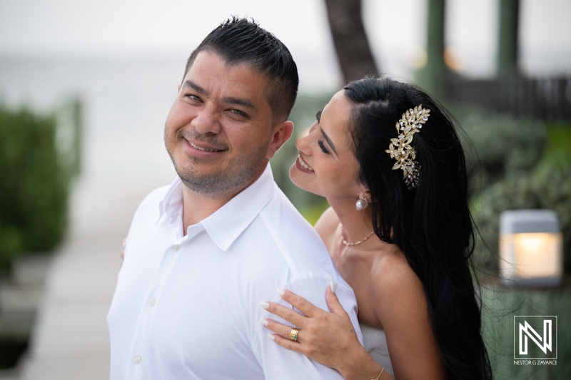 Wedding ceremony at Avila Beach Hotel in Curacao with couple by the ocean