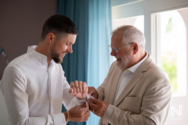 Groom prepares for wedding ceremony at Karakter in Curacao with heartfelt moments shared