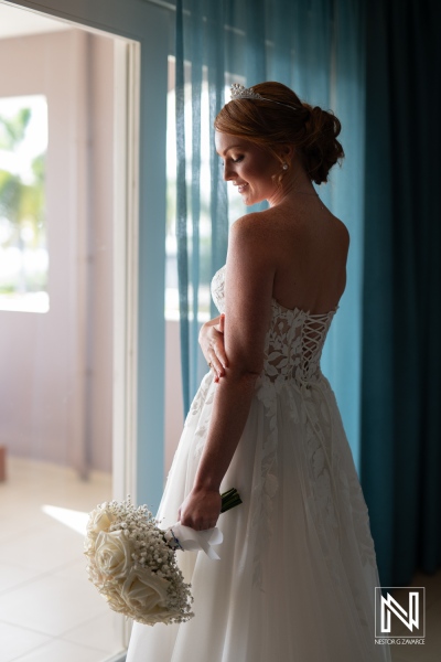 Beautiful bride prepares for wedding ceremony at Karakter in Curacao under soft natural light