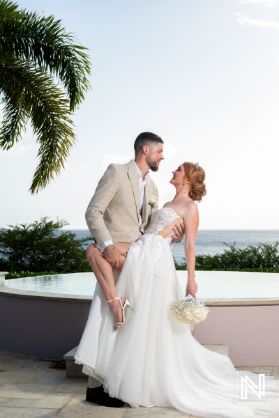 Romantic wedding celebration at Karakter in Curacao during sunset with stunning ocean views