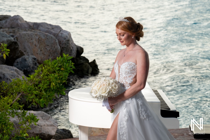 Beautiful wedding ceremony at Karakter in Curacao featuring a serene bride by the water