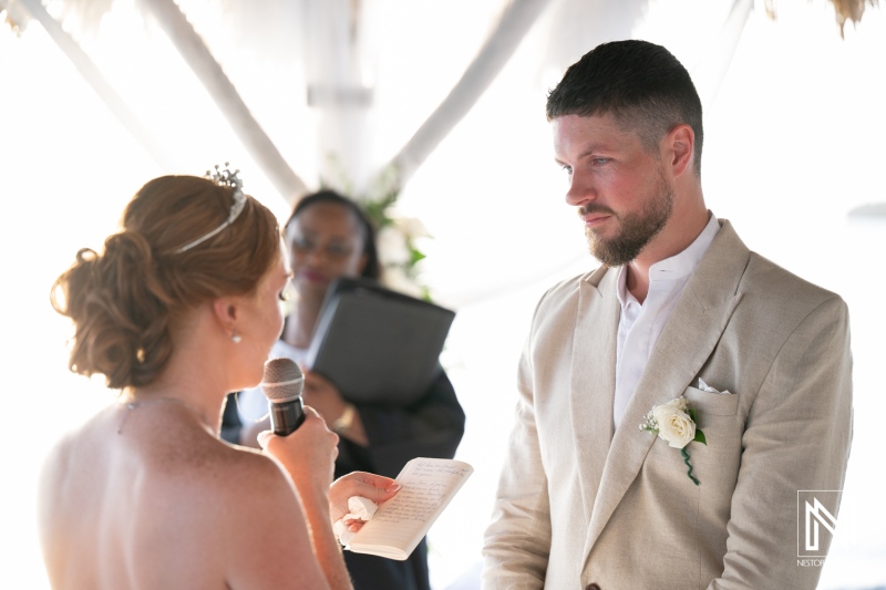 Wedding ceremony at Karakter, Curacao with heartfelt vows exchanged between the couple